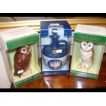 Two Royal Doulton 'owl' decanters together with a