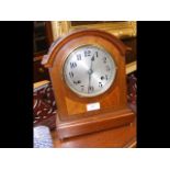 A 31cm high striking mantel clock