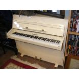 A Zender upright piano - width 116cm