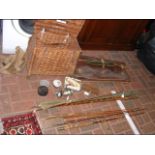 A selection of old fly fishing rods together with