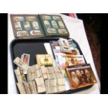 A tray containing collectable cigarette cards