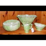 A collection of green lustre Maling ware pottery