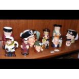 A large collection of Royal Doulton character jugs