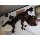 A large metal wall gecko - approx. 2 metres in len