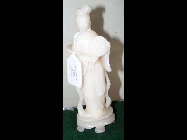 An antique white jade statue of Guin Jin - 20cms h