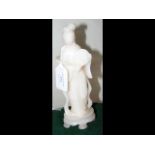 An antique white jade statue of Guin Jin - 20cms h