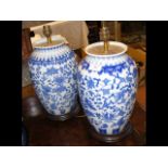 A pair of Oriental style table lamps with blue gla