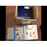 A box of albums and loose stamps - World and Commo