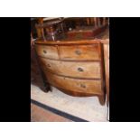 A mahogany bow fronted chest of drawers