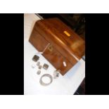 A walnut jewellery box together with silver bangle