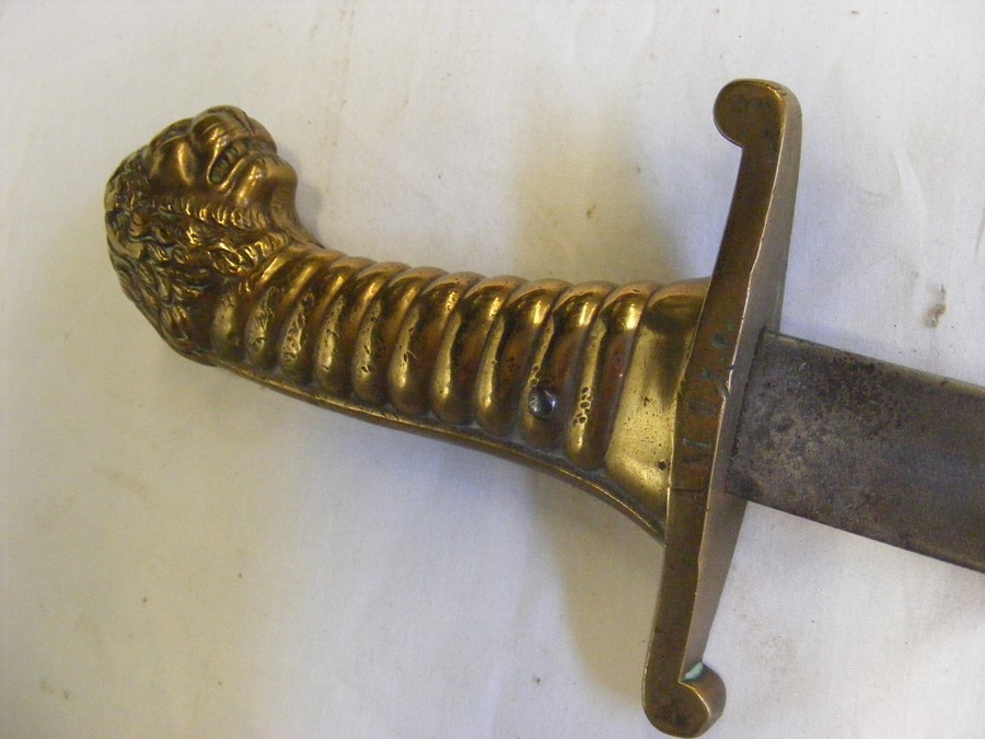 An antique short sword with stylized brass grip an - Image 4 of 5