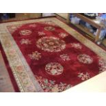 A very large Chinese style carpet with geometric b