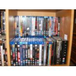 A generous assortment of Blu-ray DVD's (50+)