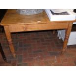 A Victorian pine kitchen table with single drawer