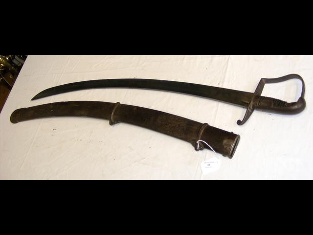 An antique Cavalry sword with metal scabbard and w