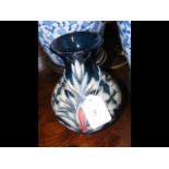 A Moorcroft 'snakehead' pattern vase designed by R