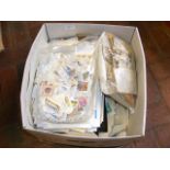 A box of albums of stamps, loose pages, large quan