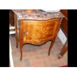 An elegant French marquetry side table with shaped