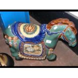 A 46cm high glazed pottery garden horse ornament