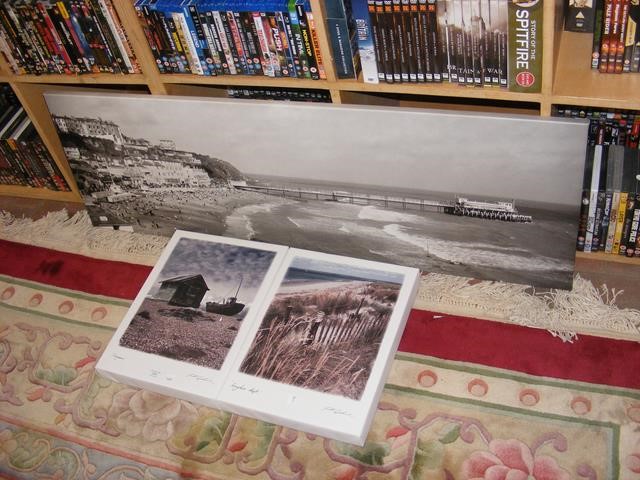 Three canvas prints of coastal scenes