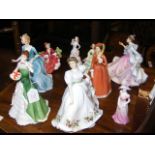 A quantity of Coalport and Royal Doulton lady figu