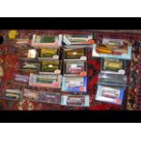 A selection of 20 boxed die cast model coaches and