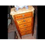 A French narrow five drawer chest of drawers with