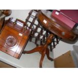 A mahogany drum table with three drawers together