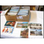 Two boxes containing topographical postcards - UK