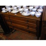 An oak three drawer chest