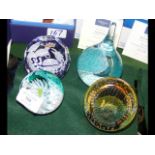 Four unboxed Caithness paperweights