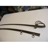 An antique curved Cavalry sword with metal scabbar