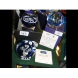 Two boxed Caithness glass paperweights including o