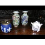 A pair of Oriental vases together with a biscuit b