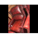 A Victorian style wing easy chair