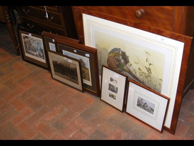 A medley of framed and glazed prints and pictures