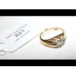 A diamond solitaire ring in 18ct setting