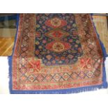 An Iranian wall hanging with geometric border - 190cm x 150cm