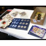 A box of mixed collectable ephemera, coins, postca