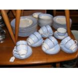 A suite of Doulton dinner and tea ware