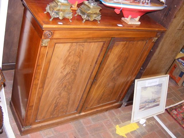 A 19th century mahogany two door cupboard - 110cms