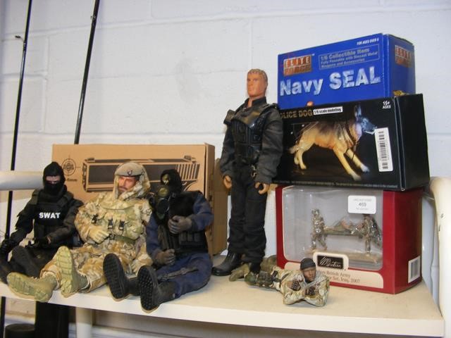 A boxed Elite Force fully poseable Navy Seal, in a