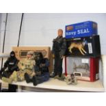 A boxed Elite Force fully poseable Navy Seal, in a