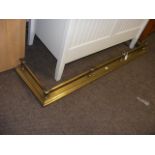 A brass fire fender - width 123cms