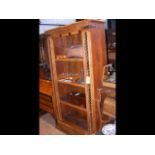 The matching bookcase with wrought iron detail - w