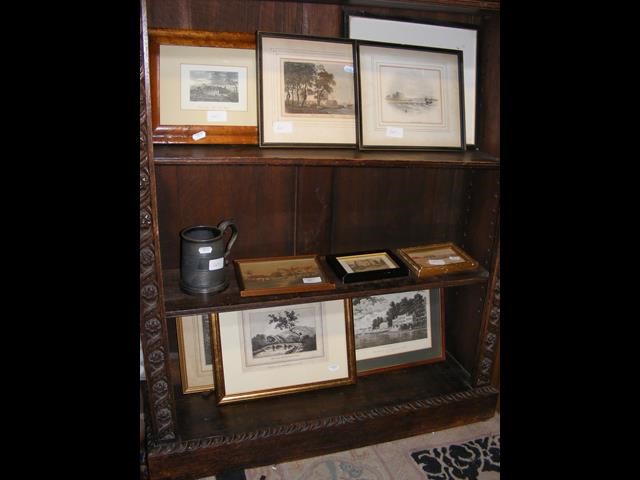 An assortment of framed and glazed prints and engr