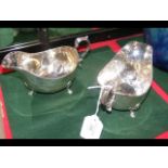 A pair of silver sauce boats