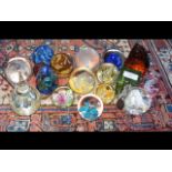 A collection of seventeen glass paperweights