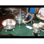 A three piece silver tea set with Sheffield hallma