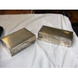 Two silver clad cigarette boxes